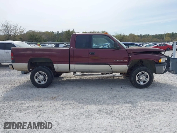2002 Dodge 2500 z VIN 3B7KF23Z92M200971, wystawiony jako IAAI lot #41886859 z przebiegiem 217 487 mil mil oraz . Historia ofert i sprzedaży dostępna na DreamBid. Obrazek 13.