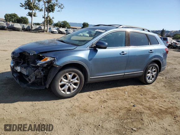 2015 Mazda CX-9 Touring with VIN JM3TB2CV1F0469009, listed as a Copart auction lot 59225785 with 93,330 mi miles and Salvage title. Bid and sale history available at DreamBid. Image 1.