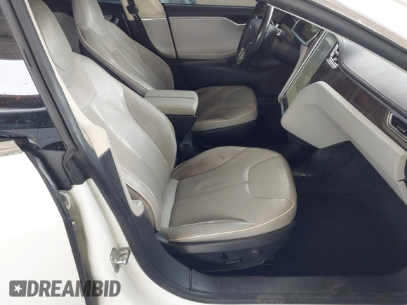 2013 Tesla Model S с VIN 5YJSA1CG8DFP22036, выставлен на аукционе IAAI как лот 41886249 с пробегом 125 477 миль миль и . История ставок и продаж доступна на DreamBid. Изображение 5.