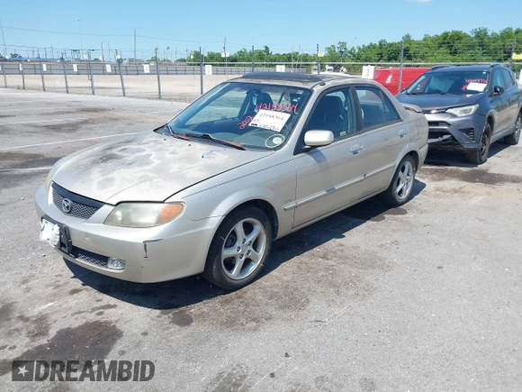 2002 Mazda Protege DX with VIN JM1BJ225820568350, listed as a IAAI auction lot 42188364 with 52,572 mi miles and . Bid and sale history available at DreamBid. Image 2.
