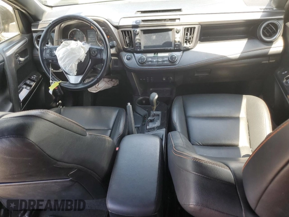 2016 Toyota RAV4 SE with VIN JTMNFREV2GJ072643, listed as a Copart auction lot 63879695 with 104,118 mi miles and Salvage title. Bid and sale history available at DreamBid. Image 8.