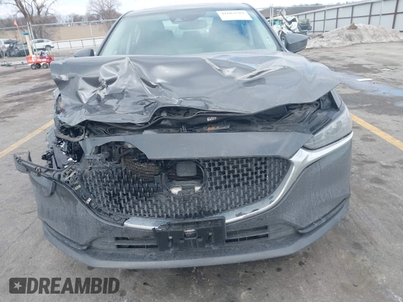 2020 Mazda 6 Grand Touring with VIN JM1GL1TY6L1525169, listed as a IAAI auction lot 41683512 with 73,313 mi miles and . Bid and sale history available at DreamBid. Image 6.
