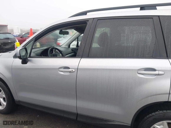 2015 Subaru Forester 2.5i Premium with VIN JF2SJADC2FH830877, listed as a IAAI auction lot 41594954 with 128,984 mi miles. Bid and sale history available at carsss.com. Image 14.