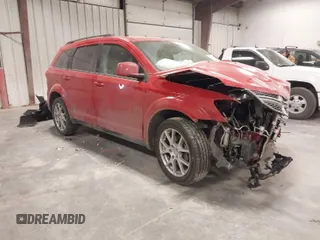 2014 Dodge Journey SXT z VIN 3C4PDDBG1ET259286, wystawiony jako IAAI lot #41369529 z przebiegiem 107 960 mil mil oraz . Historia ofert i sprzedaży dostępna na DreamBid. Obrazek 1.
