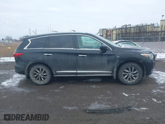 2015 Infiniti QX60 z VIN 5N1AL0MM7FC524175, wystawiony jako IAAI lot #41417720 z przebiegiem 124 622 mil mil oraz . Historia ofert i sprzedaży dostępna na DreamBid. Obrazek 13.