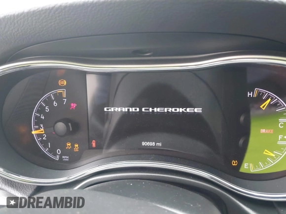 2020 Jeep Grand Cherokee Altitude with VIN 1C4RJEAG3LC202749, listed as a IAAI auction lot 42272959 with 90,698 mi miles and . Bid and sale history available at DreamBid. Image 7.