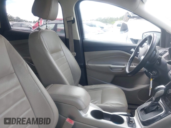 2013 Ford Escape SEL with VIN 1FMCU0H97DUC94687, listed as a IAAI auction lot 42024797 with 207,216 mi miles. Bid and sale history available at carsss.com. Image 5.