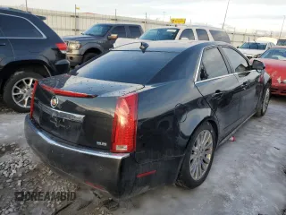 2011 Cadillac CTS Premium with VIN 1G6DS5ED7B0132361, listed as a Copart auction lot 88530075 with 124,176 mi miles and Salvage Title. Bid and sale history available at carsss.com. Image 3.
