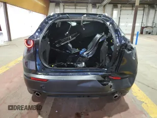 2024 Mazda CX-30 S Carbon Edition with VIN 3MVDMBCM7RM660402, listed as a Copart auction lot 59379585 with 25,912 mi miles and Salvage title. Bid and sale history available at DreamBid. Image 6.