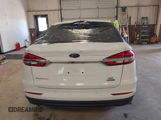 2020 Ford Fusion Hybrid SE with VIN 3FA6P0LU7LR173500, listed as a IAAI auction lot 41368311 with 105,202 mi miles. Bid and sale history available at carsss.com. Image 17.
