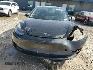 2023 Tesla Model 3 with VIN 5YJ3E1EAXPF708001, listed as a Copart auction lot 57252735 with 71,579 mi miles and Salvage title. Bid and sale history available at DreamBid. Image 5.