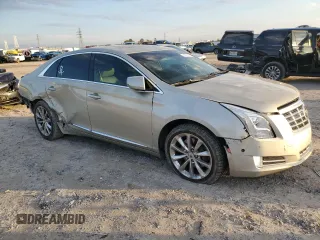 2014 Cadillac XTS Premium z VIN 2G61P5S3XE9246932, wystawiony jako Copart lot #84531124 z przebiegiem 152 330 mil mil oraz Szkoda całkowita • Salvage title. Historia ofert i sprzedaży dostępna na DreamBid. Obrazek 4.
