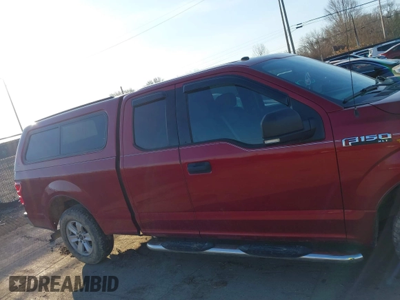 2018 Ford F-150 XL z VIN 1FTEX1CPXJKC77681, wystawiony jako IAAI lot #41749323 z przebiegiem 65 159 mil mil oraz . Historia ofert i sprzedaży dostępna na DreamBid. Obrazek 13.