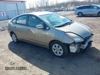 2007 Toyota Prius z VIN JTDKB20U477693853, wystawiony jako IAAI lot #41854273 z przebiegiem 78 913 mil mil oraz . Historia ofert i sprzedaży dostępna na DreamBid. Obrazek 1.