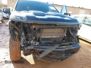 2023 Chevrolet Silverado 1500 LT Trail Boss with VIN 3GCUDFE86PG293500, listed as a IAAI auction lot 41071914 with 17,903 mi miles and . Bid and sale history available at DreamBid. Image 6.