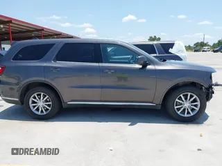 2016 Dodge Durango SXT with VIN 1C4RDHAG0GC301611, listed as a IAAI auction lot 42486013 with 136,997 mi miles and . Bid and sale history available at DreamBid. Image 14.