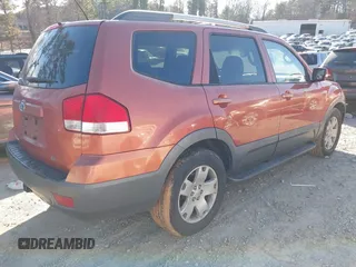 2009 Kia Borrego LX with VIN KNDJJ741295024393, listed as a IAAI auction lot 41368035 with 226,220 mi miles. Bid and sale history available at carsss.com. Image 4.