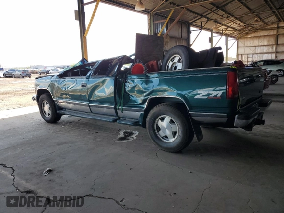 1997 GMC Sierra 1500 z VIN 2GTEK19RXV1501674, wystawiony jako Copart lot #59061595 z przebiegiem 138 998 mil mil oraz Szkoda całkowita • Salvage title. Historia ofert i sprzedaży dostępna na DreamBid. Obrazek 2.
