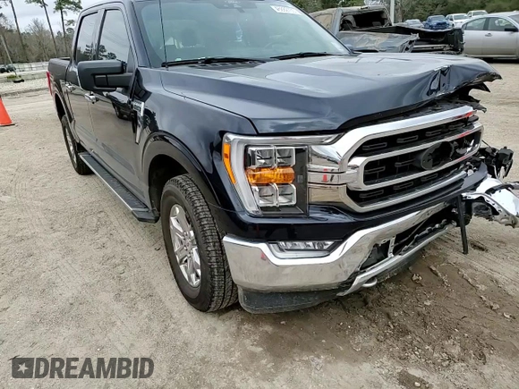 2021 Ford F-150 XL with VIN 1FTFW1E50MFA45896, listed as a Copart auction lot 46882735 with 57,041 mi miles and Salvage Title. Bid and sale history available at DreamBid. Image 11.