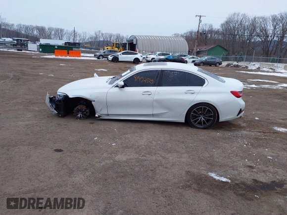2021 BMW 3 Series 330i xDrive with VIN WBA5R7C05MFL03288, listed as a IAAI auction lot 41492559 with 47,170 mi miles and . Bid and sale history available at DreamBid. Image 14.