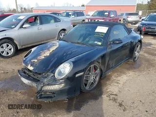 2007 Porsche 911 Carrera S z VIN WP0CB299X7S777014, wystawiony jako IAAI lot #41463577 z przebiegiem Nie podano mil oraz . Historia ofert i sprzedaży dostępna na DreamBid. Obrazek 2.