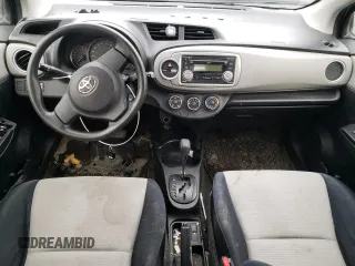 2012 Toyota Yaris L with VIN JTDKTUD33CD517298, listed as a Copart auction lot 52099335 with Not Provided miles and Salvage Title. Bid and sale history available at DreamBid. Image 8.