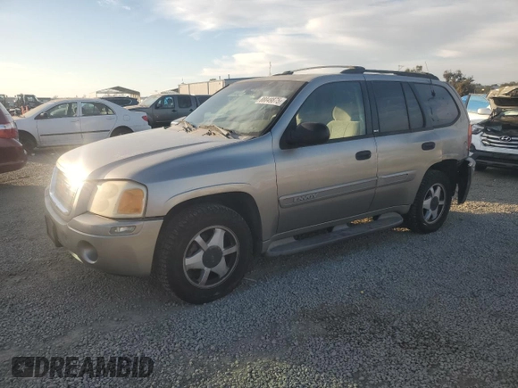2002 GMC Envoy SLT with VIN 1GKDS13S922287249, listed as a Copart auction lot 88049875 with 157,485 mi miles and Salvage Title. Bid and sale history available at carsss.com. Image 1.