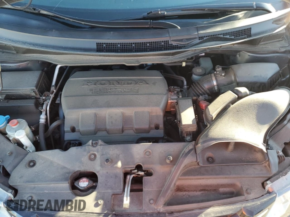 2015 Honda Odyssey Touring Elite with VIN 5FNRL5H94FB037299, listed as a Copart auction lot 53886345 with 109,032 mi miles and Salvage Title. Bid and sale history available at DreamBid. Image 12.
