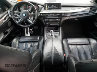2016 BMW X5 M with VIN 5YMKT6C50G0R78042, listed as a Copart auction lot 39414444 with 105,898 mi miles. Bid and sale history available at carsss.com. Image 8.