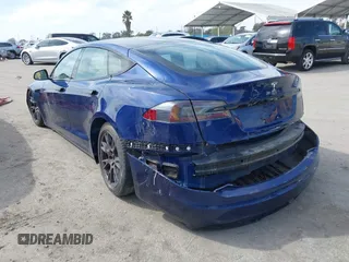 2021 Tesla Model S Long Range with VIN 5YJSA1E51MF442874, listed as a IAAI auction lot 39406495 with 36,127 mi miles and . Bid and sale history available at DreamBid. Image 3.