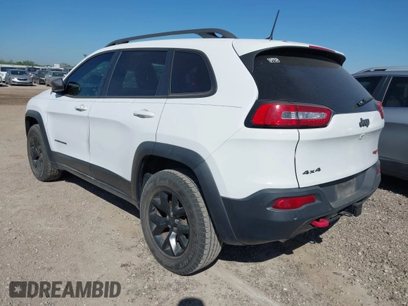 2017 Jeep Cherokee Trailhawk L Plus with VIN 1C4PJMBS3HD227978, listed as a IAAI auction lot 42242791 with 76,982 mi miles and . Bid and sale history available at DreamBid. Image 3.