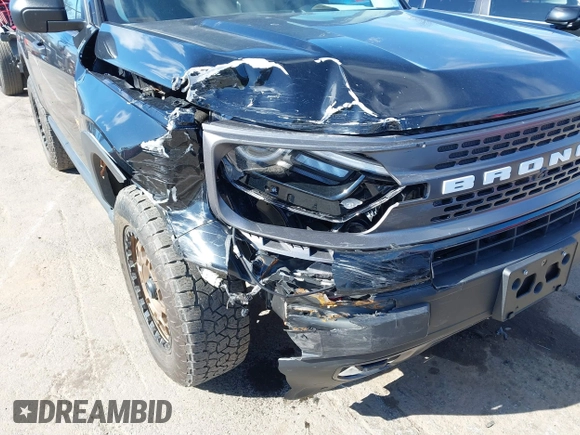 2023 Ford Bronco Sport Badlands z VIN 3FMCR9D95PRD26169, wystawiony jako IAAI lot #41723643 z przebiegiem 21 181 mil mil oraz . Historia ofert i sprzedaży dostępna na DreamBid. Obrazek 6.