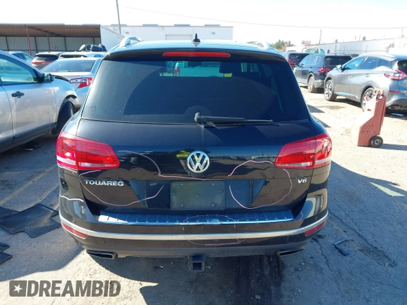 2016 Volkswagen Touareg Sport with VIN WVGEF9BP4GD012265, listed as a IAAI auction lot 41208383 with 69,205 mi miles and . Bid and sale history available at DreamBid. Image 16.