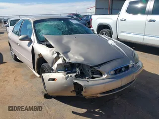 1998 Mercury Sable GS with VIN 1MEFM50U8WG612055, listed as a IAAI auction lot 41618826 with 84,689 mi miles and . Bid and sale history available at DreamBid. Image 1.