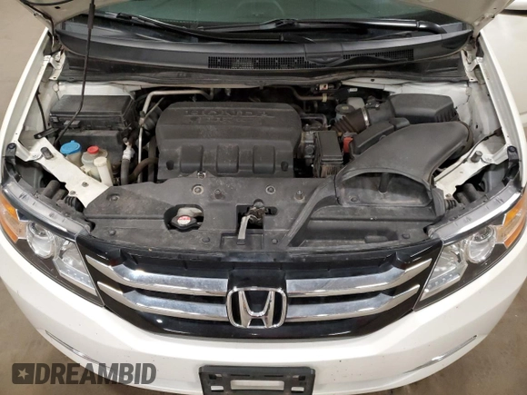 2016 Honda Odyssey EX-L with VIN 5FNRL5H67GB090747, listed as a Copart auction lot 53957235 with 131,464 mi miles and Salvage Title. Bid and sale history available at DreamBid. Image 12.