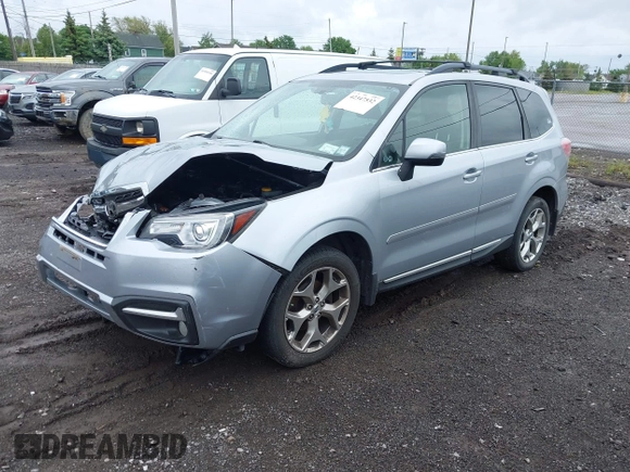2018 Subaru Forester Touring with VIN JF2SJAWC6JH496875, listed as a IAAI auction lot 42347532 with 70,978 mi miles and . Bid and sale history available at DreamBid. Image 17.