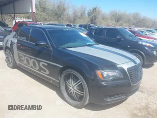 2013 Chrysler 300 with VIN 2C3CCABG1DH709935, listed as a IAAI auction lot 41814279 with 101,174 mi miles. Bid and sale history available at carsss.com. Image 1.