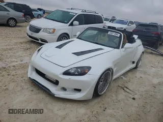 2004 Honda S2000 with VIN JHMAP21474T002439, listed as a Copart auction lot 83911894 with 55,856 mi miles and Clean Title. Bid and sale history available at DreamBid. Image 1.