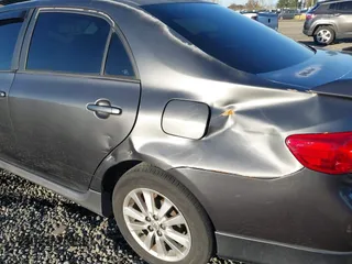 2010 Toyota Corolla with VIN 2T1BU4EEXAC475395, listed as a IAAI auction lot 41687183 with 193,608 mi miles. Bid and sale history available at carsss.com. Image 18.