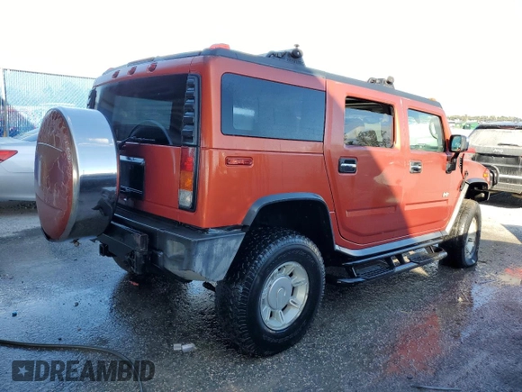 2003 Hummer H2 with VIN 5GRGN23U73H141713, listed as a Copart auction lot 84285624 with 152,719 mi miles and Non Repairable. Bid and sale history available at carsss.com. Image 3.