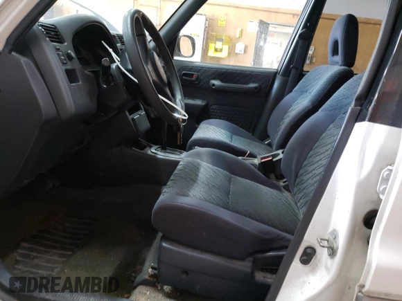 2000 Toyota RAV4 z VIN JT3GP10V5Y0049271, wystawiony jako Copart lot #56158045 z przebiegiem 188 900 mil mil oraz Czysty tytuł • Clean title. Historia ofert i sprzedaży dostępna na DreamBid. Obrazek 7.