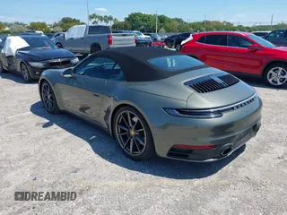 2020 Porsche 911 Carrera S with VIN WP0CB2A97LS263238, listed as a IAAI auction lot 42021346 with 23,899 mi miles. Bid and sale history available at carsss.com. Image 3.