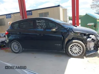 2013 Ford C-Max SE z VIN 1FADP5AUXDL511432, wystawiony jako IAAI lot #42314733 z przebiegiem 140 616 mil mil oraz . Historia ofert i sprzedaży dostępna na DreamBid. Obrazek 13.