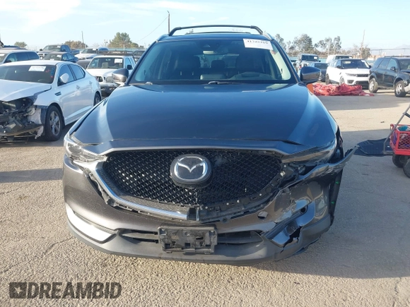 2018 Mazda CX-5 Grand Touring with VIN JM3KFBDM0J0405574, listed as a IAAI auction lot 41725319 with 44,380 mi miles. Bid and sale history available at carsss.com. Image 12.