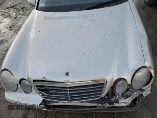 2002 Mercedes-Benz E-Class with VIN WDBJF82J32X066803, listed as a Copart auction lot 85474614 with 77,358 mi miles and Salvage Title. Bid and sale history available at carsss.com. Image 11.