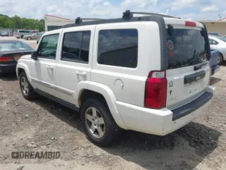 2010 Jeep Commander Sport z VIN 1J4RG4GK7AC127808, wystawiony jako IAAI lot #42479312 z przebiegiem 161 385 mil mil oraz . Historia ofert i sprzedaży dostępna na DreamBid. Obrazek 3.