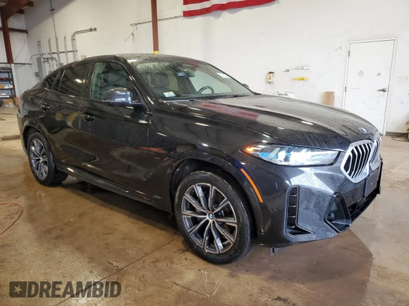 2025 BMW X6 xDrive40i with VIN 5UX33EX00S9W90983, listed as a Copart auction lot 46921935 with 25,566 mi miles and Clean Title. Bid and sale history available at carsss.com. Image 4.