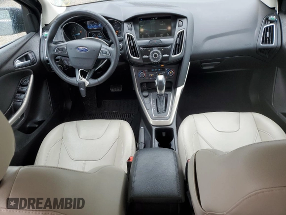 2018 Ford Focus Titanium z VIN 1FADP3N21JL295883, wystawiony jako Copart lot #59051015 z przebiegiem 43 284 mil mil oraz Szkoda całkowita • Salvage title. Historia ofert i sprzedaży dostępna na DreamBid. Obrazek 8.