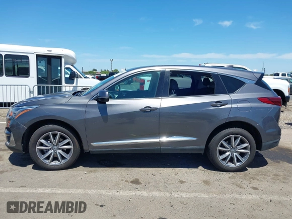 2020 Acura RDX Technology with VIN 5J8TC2H53LL014852, listed as a IAAI auction lot 39360410 with 61,341 mi miles and . Bid and sale history available at DreamBid. Image 14.