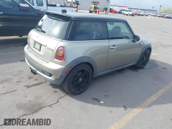 2009 MINI Hardtop S with VIN WMWMF73569TW87929, listed as a IAAI auction lot 42057214 with 164,922 mi miles and . Bid and sale history available at DreamBid. Image 4.